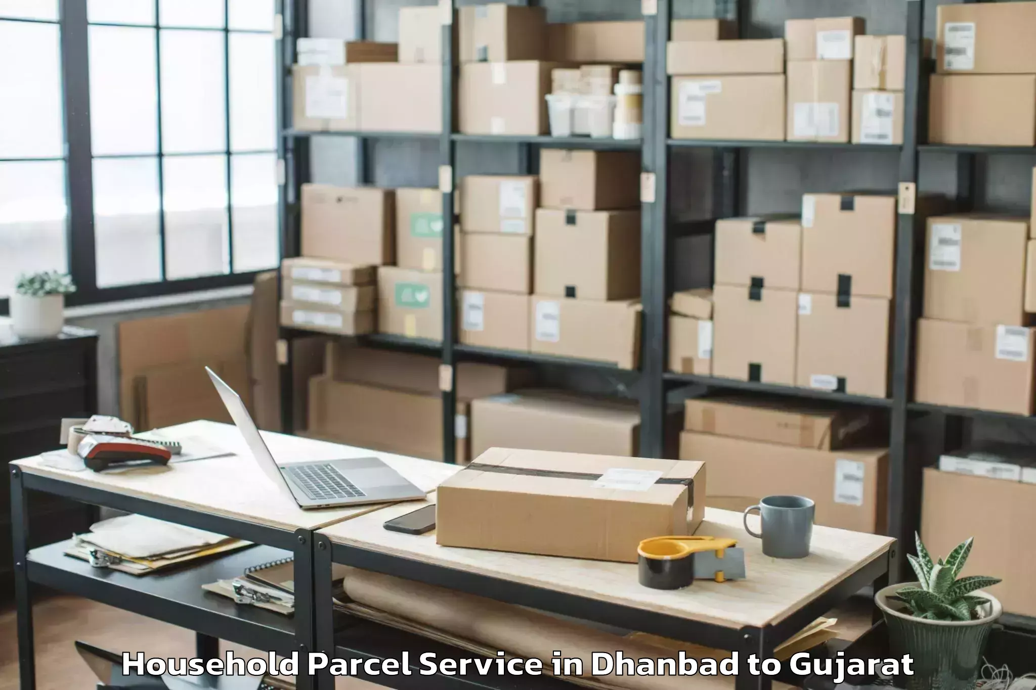 Easy Dhanbad to Modasa Household Parcel Booking